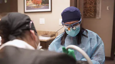 Dr. Kirshenbaum helping patient's smile with dental implants