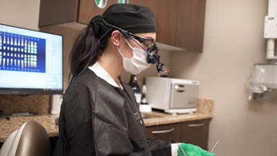 Dr. Goldman providing dental care at Bronxville Family Dental